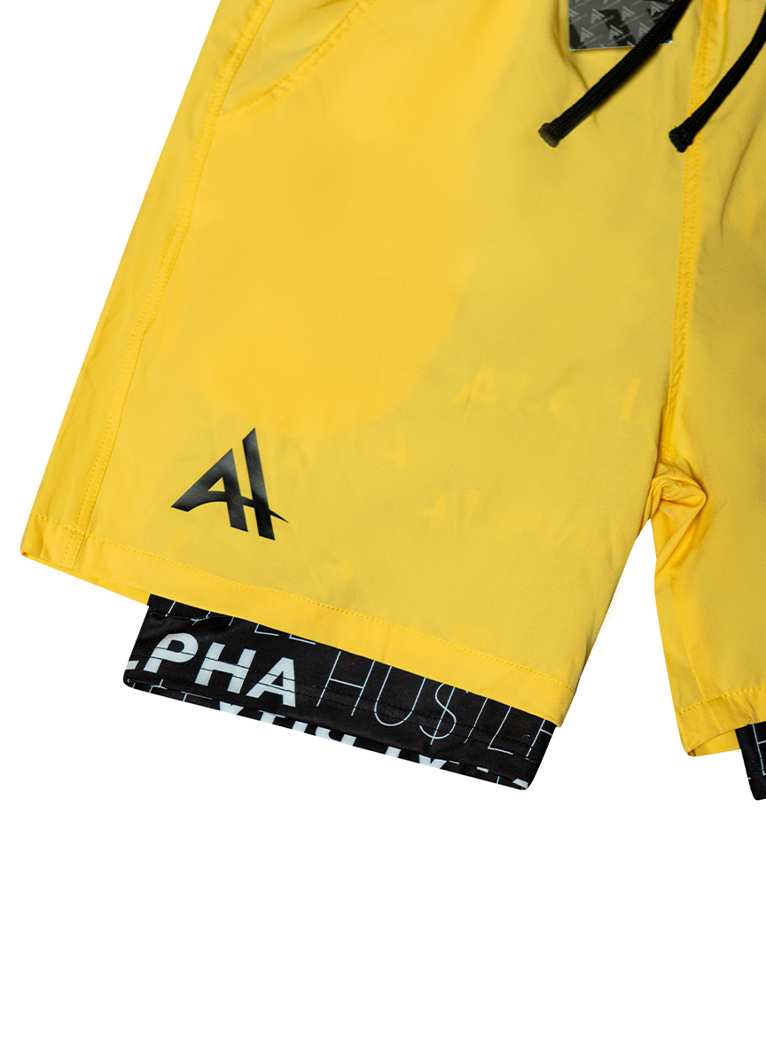 HUSTLE NON STOP SHORTS (YELLOW WITH BLACK LAYER)